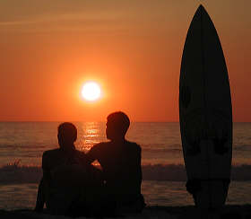 Puerto Escondido sunset surfers